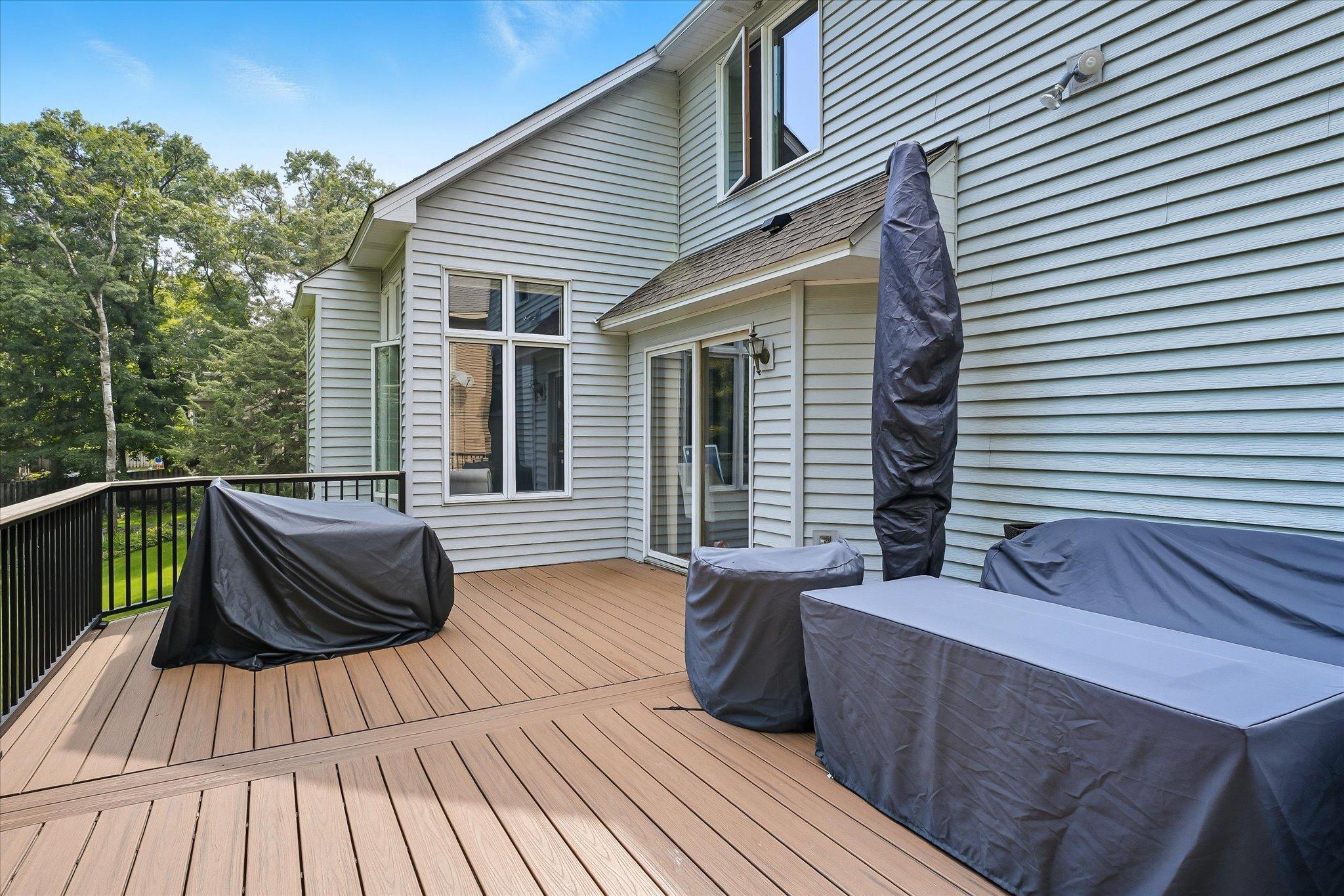 Large deck with steps to the yard