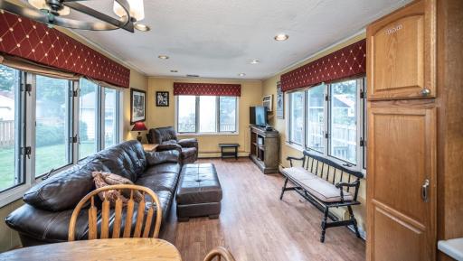 Light and bright first floor family room is located just off of the kitchen