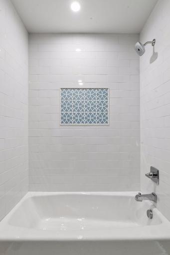 Full tub and shower combo in Jack and Jill Bath