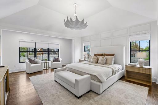 Upper level primary bedroom is its own private retreat