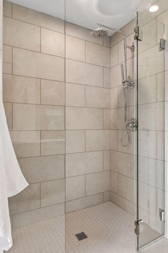 Junior Ensuite features glass paneled walk in shower