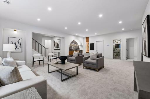 Lower level is built for entertainment. Featuring large family room space, custom built in bar and game nook.