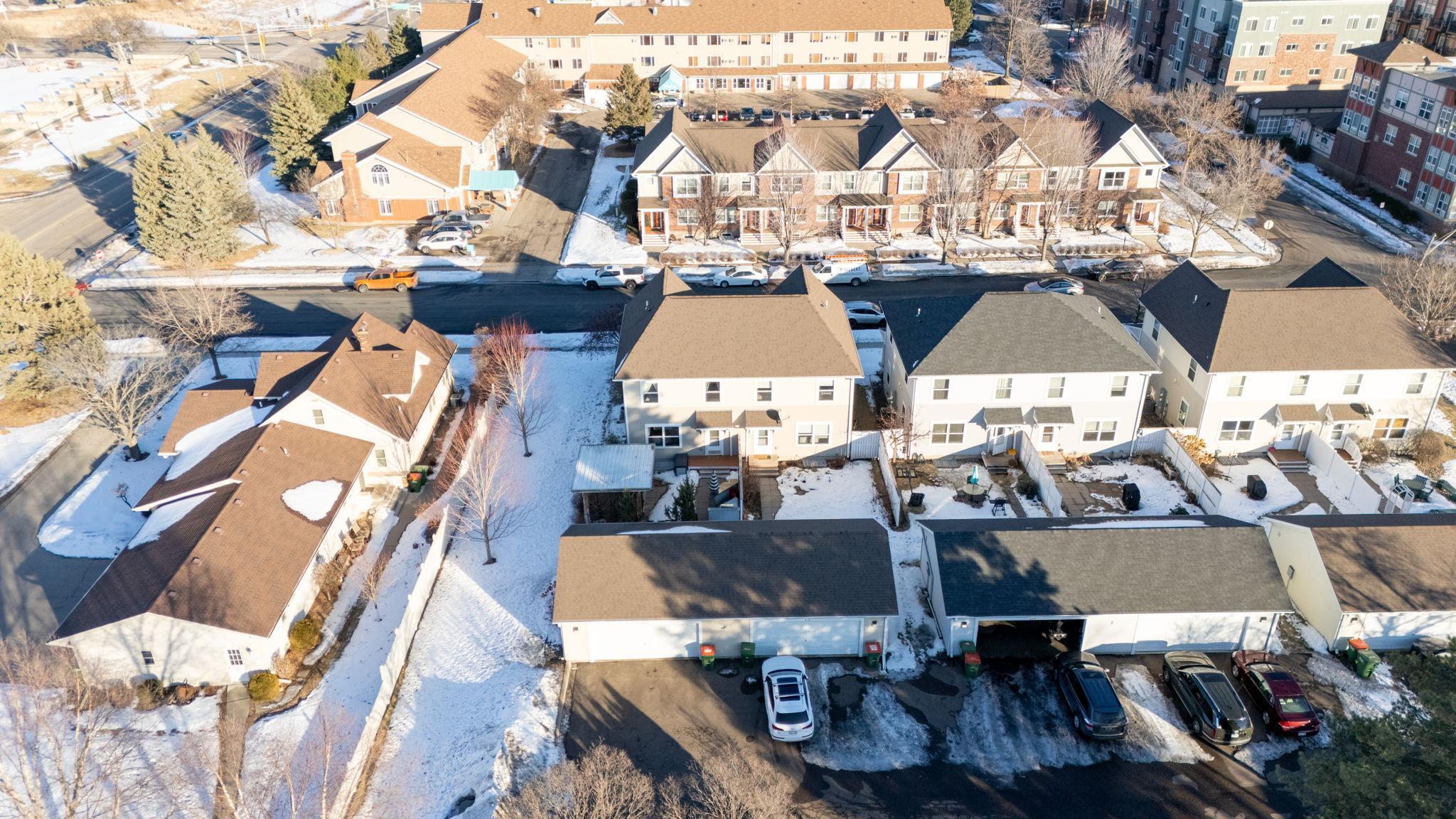 Extra-large, insulated, finished garage with durable epoxy flooring.