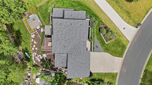 The owners invested nearly $200,000 on professional landscaping design after closing.