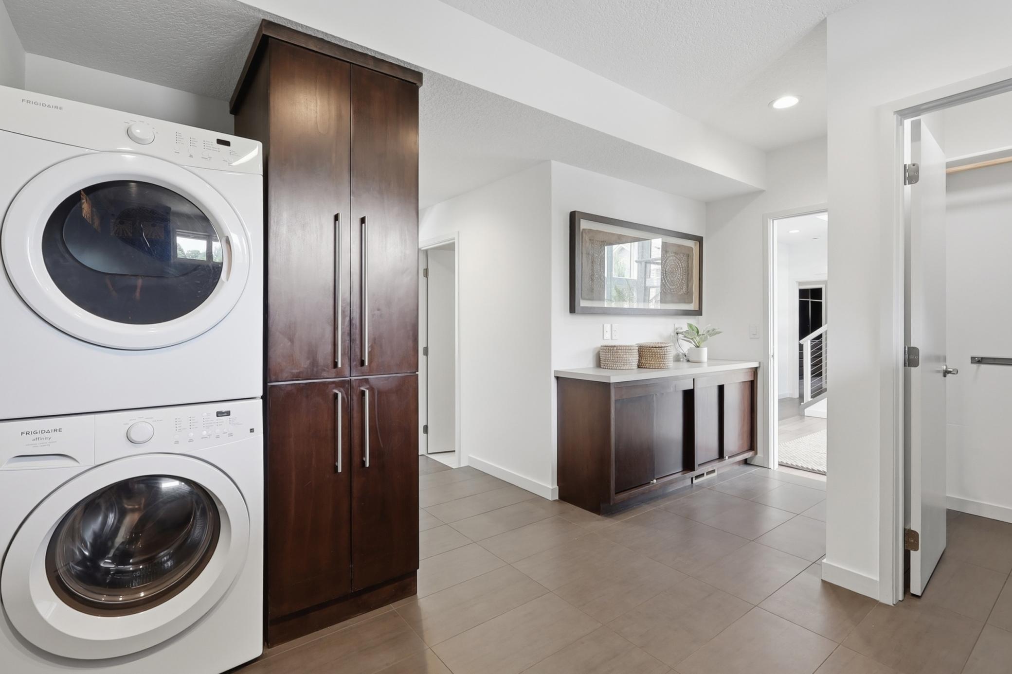 …until you’ve seen THIS mud room/laundry room/sporting equipment drop zone!