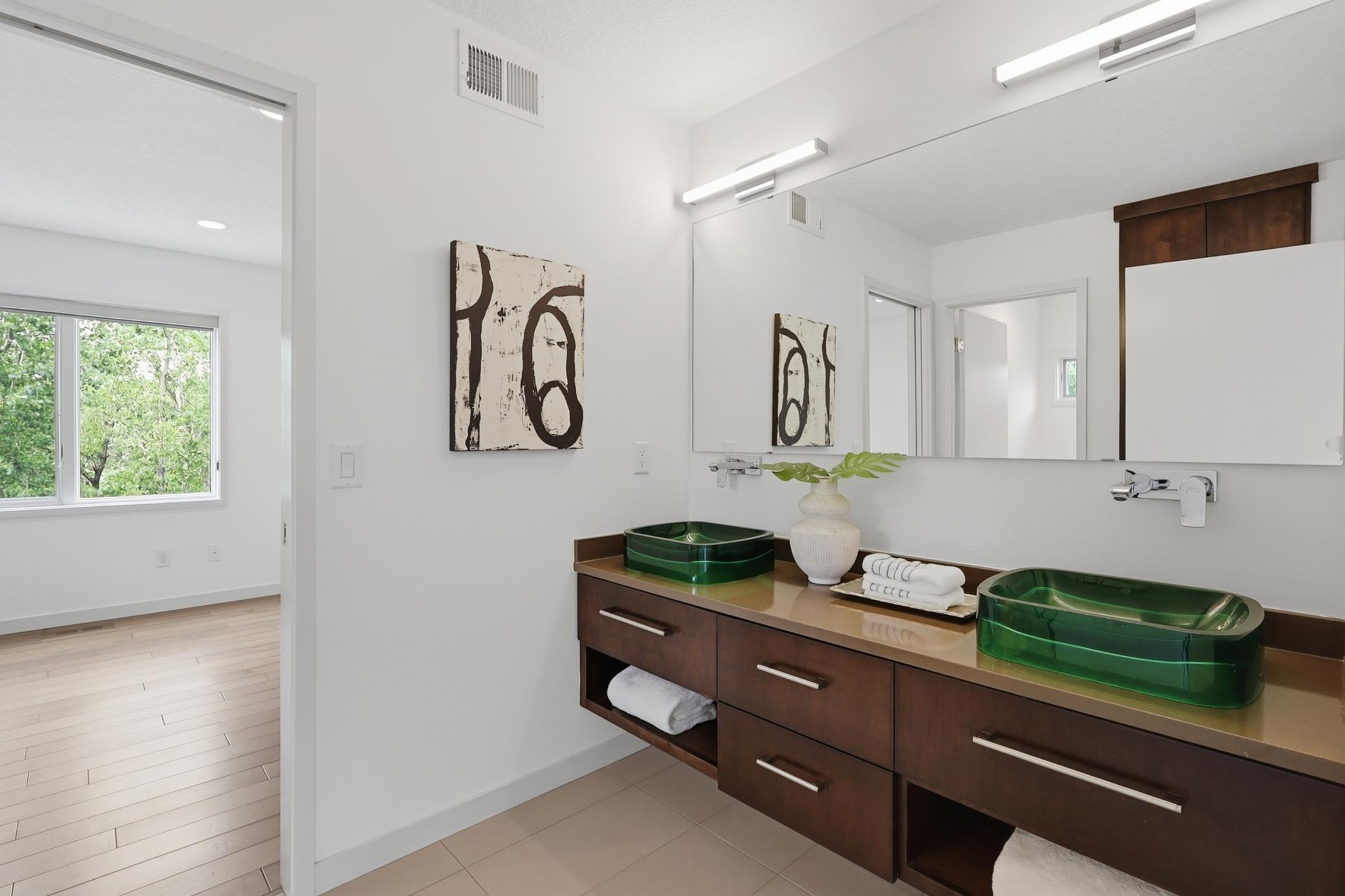 Shared full bathroom between two of the upper level bedrooms.