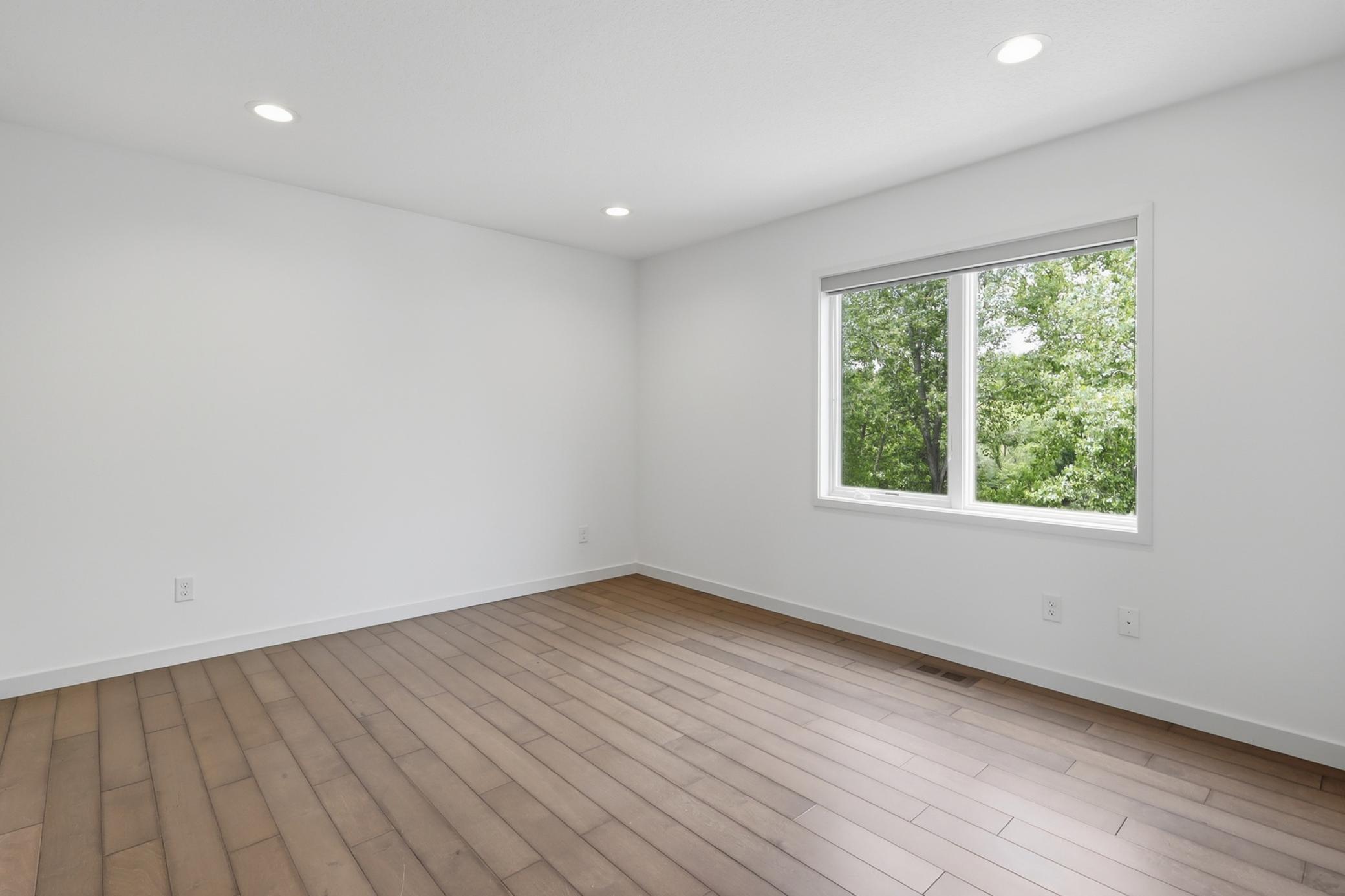 Third of the upper level bedrooms with shared bathroom.