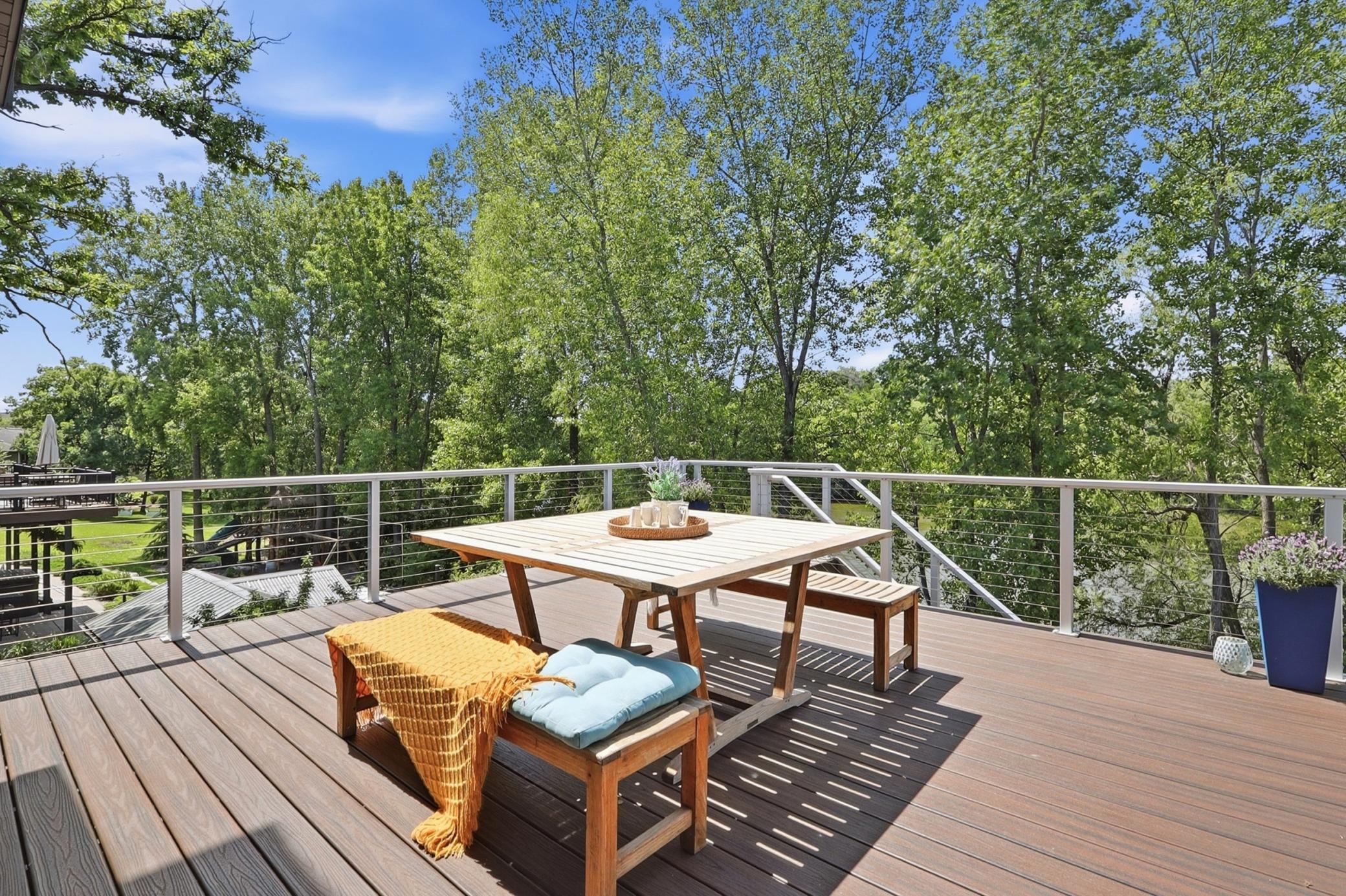 The views never get old. Enjoy this spacious maintenance free deck with panoramic views!