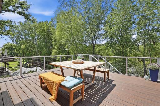 The views never get old. Enjoy this spacious maintenance free deck with panoramic views!