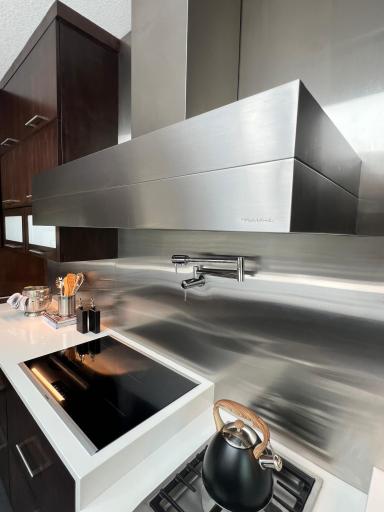 Pot filler and a dropped height gas burner for wok and stock-pot cooking