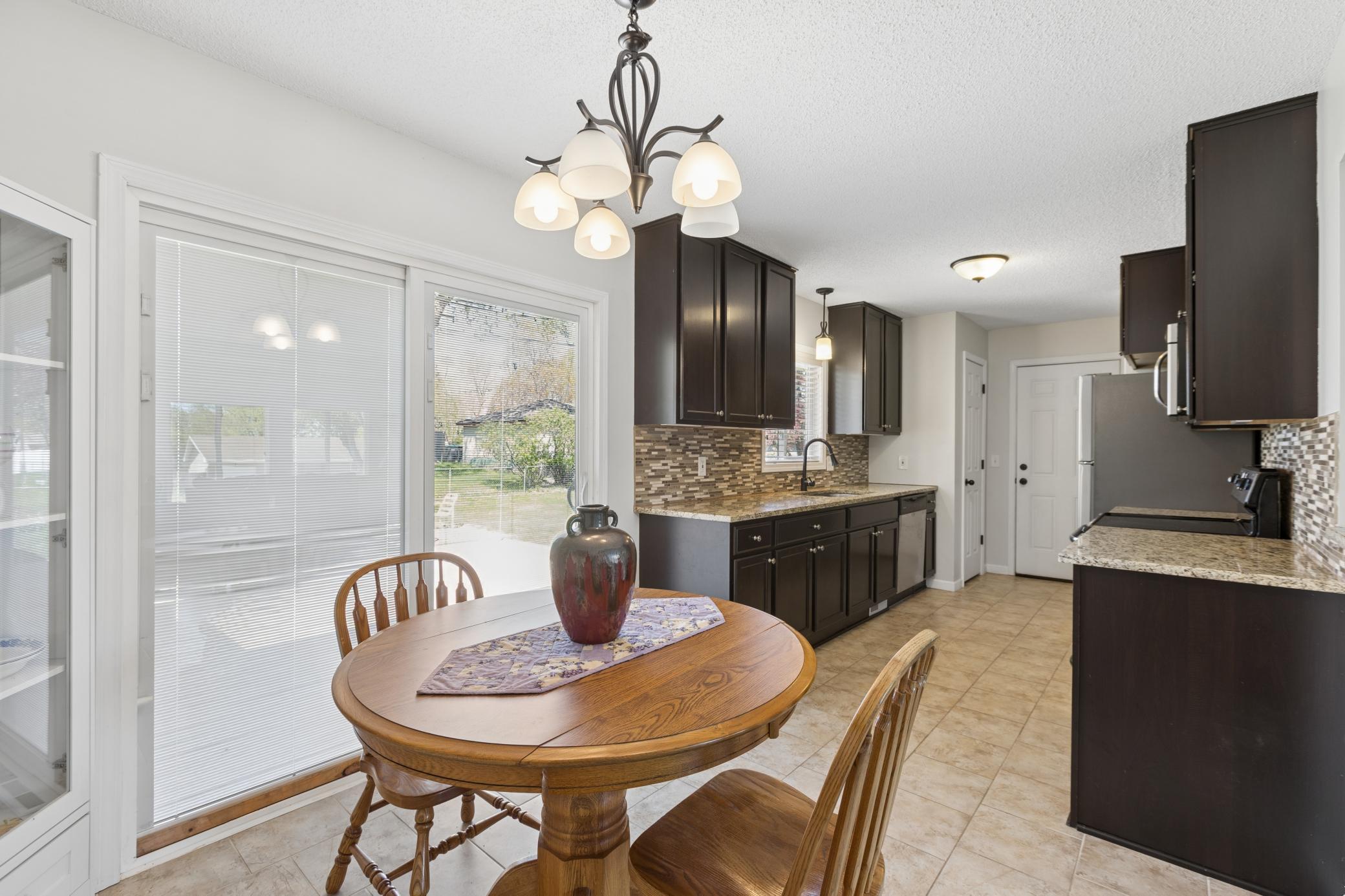 Kitchen opens to dining area