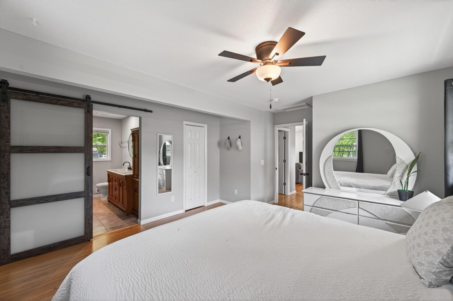 Main-level owner’s suite tucked privately away from the rest of the home..jpg