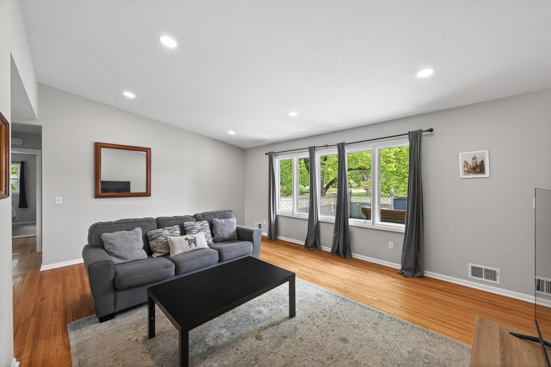 The oversized window absolutely floods this second living space with natural light. ?? • A second main-level family room like this gives the home flexibility buyers rarely find at this price point..jpg