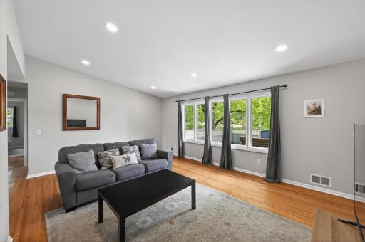The oversized window absolutely floods this second living space with natural light. ?? â¢ A second main-level family room like this gives the home flexibility buyers rarely find at this price point..jpg