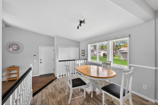 One of the homeâs most underrated features: the way the eat-in kitchen flows seamlessly into the second main-level living room..jpg