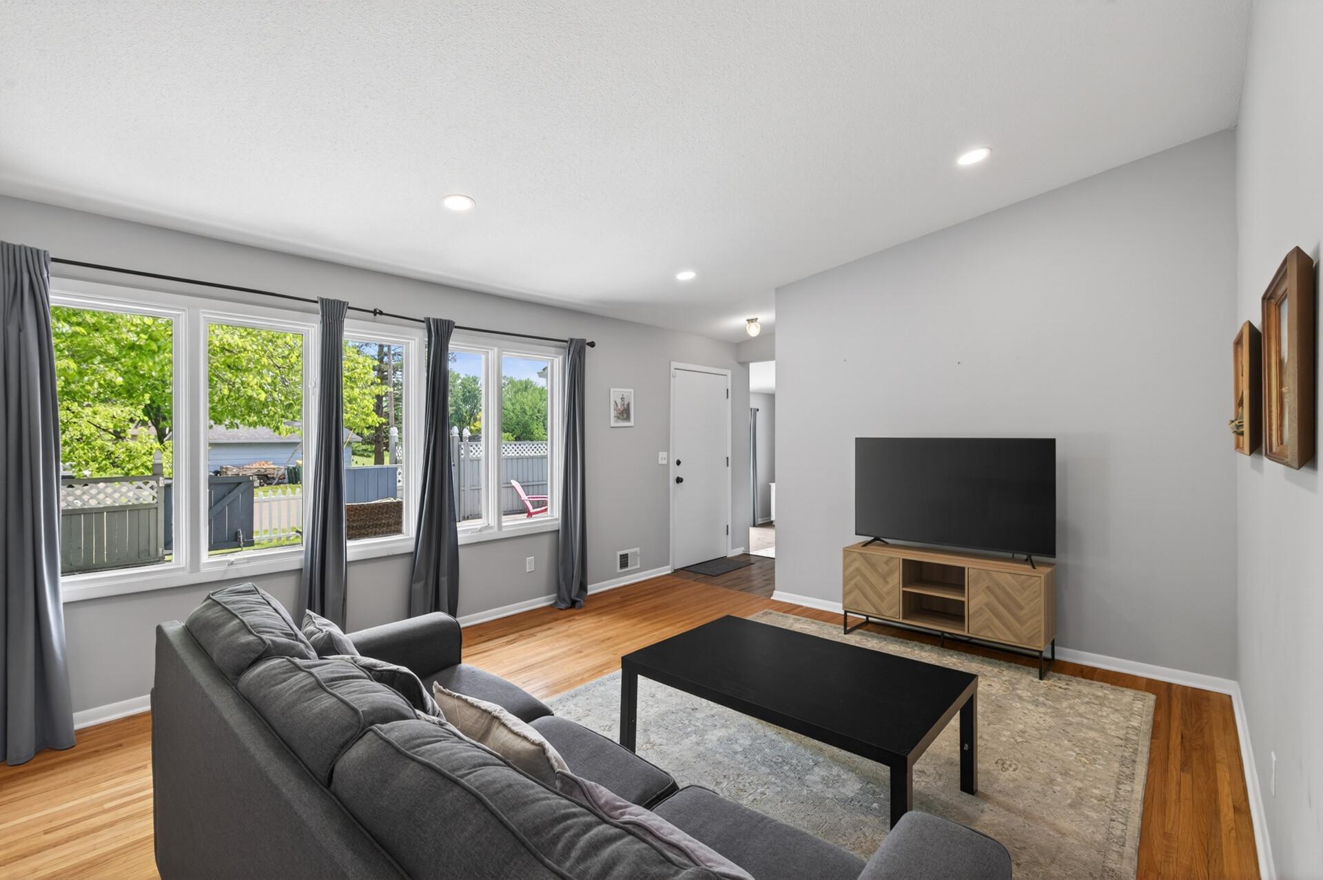 The large picture window creates such an open, airy feel throughout the room..jpg