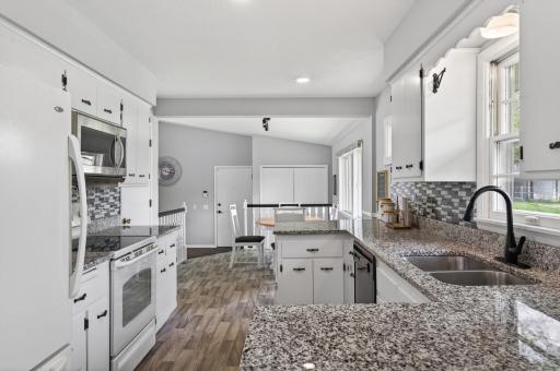 Updated kitchen with great flow into the adjacent family room..jpg