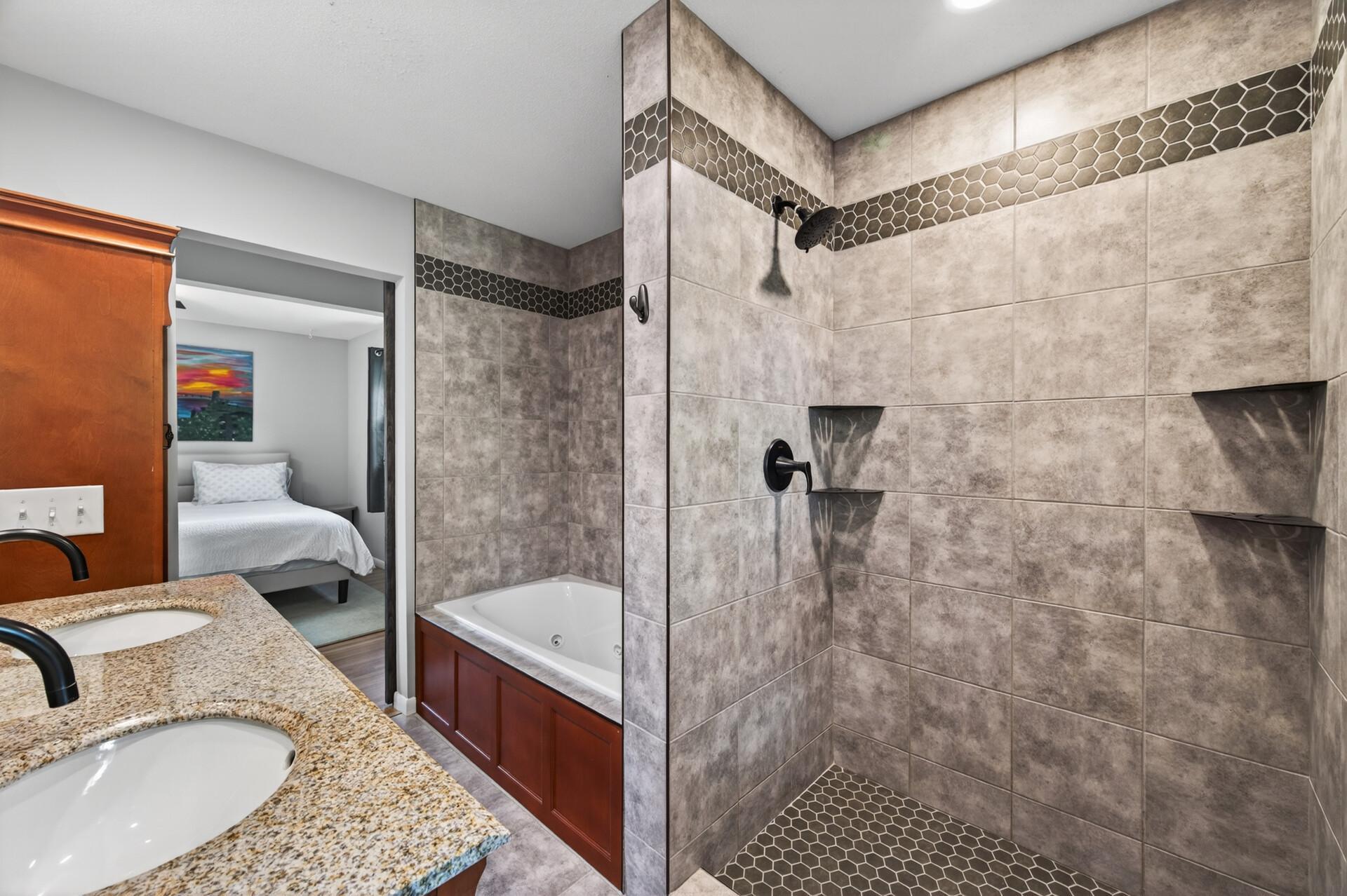 Thoughtfully designed primary bath with both comfort and functionality in mind..jpg