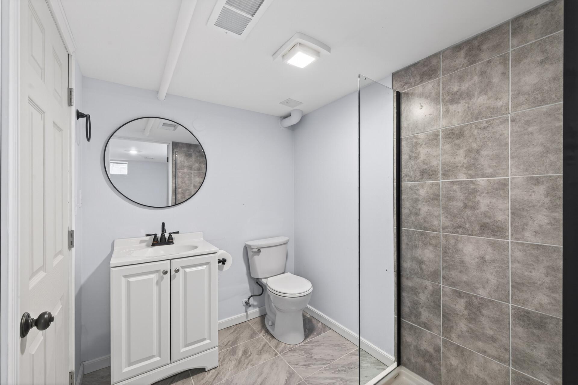Added lower-level bathroom creates a fully functional guest/flex setup..jpg