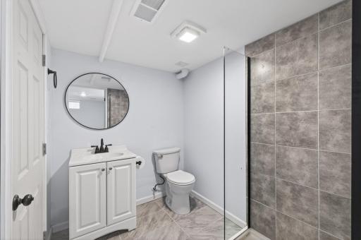 Added lower-level bathroom creates a fully functional guest/flex setup..jpg