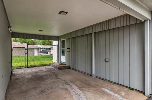 Covered breezeway connects the garage to the home â functional and charming..jpg