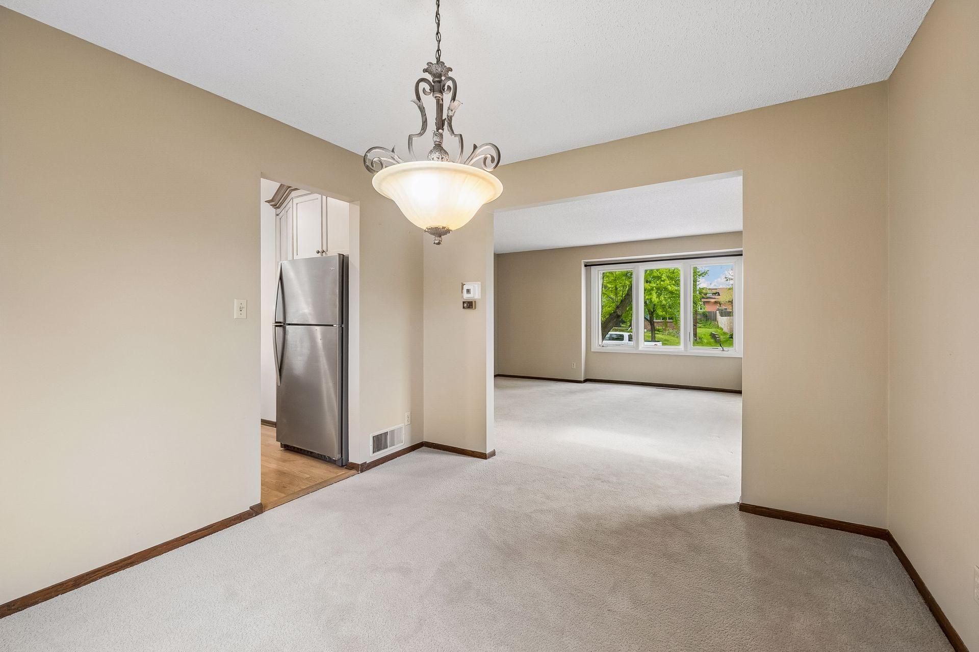 Dining Room opens to both Living Room and Kitchen