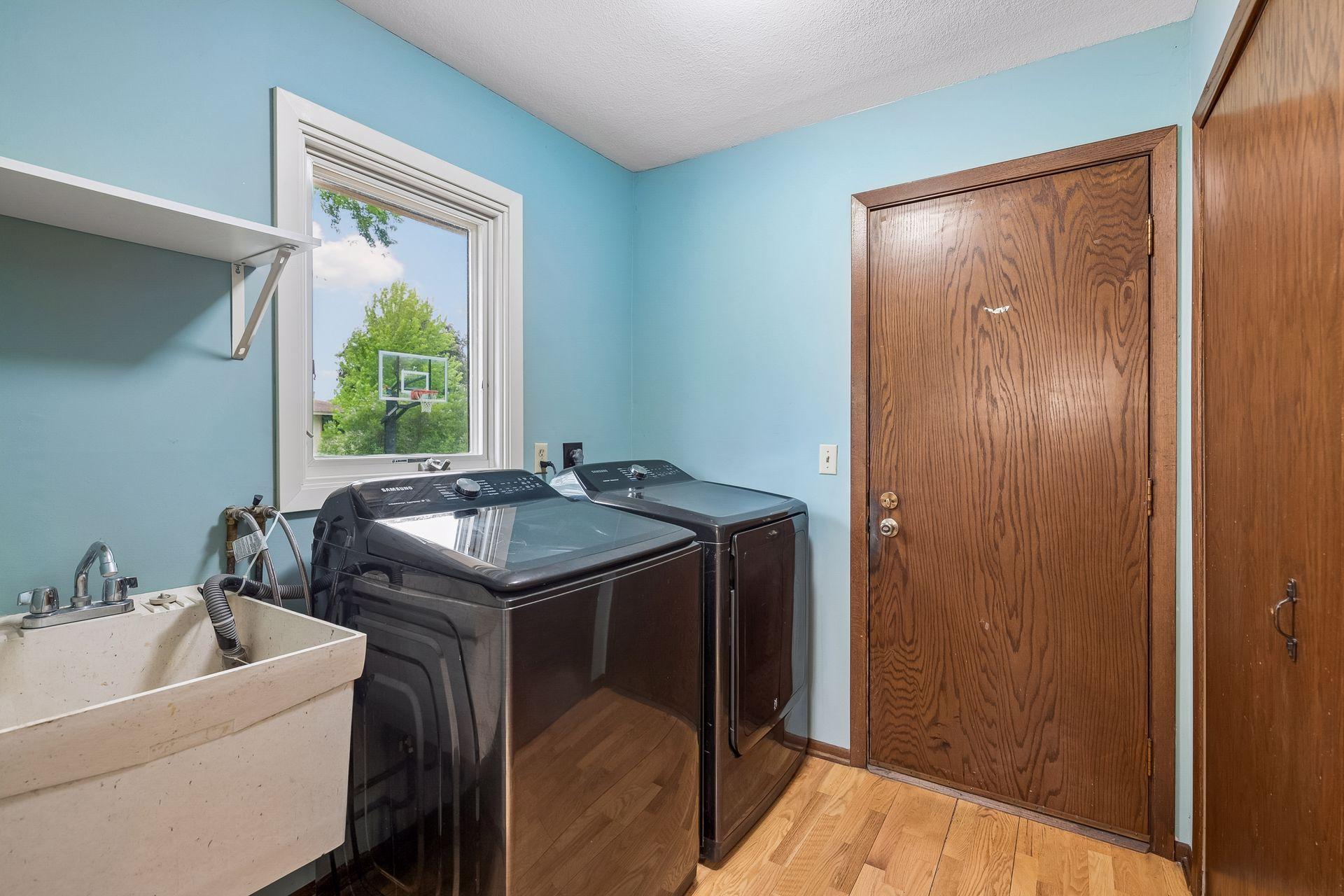 Convenient main level Laundry Room