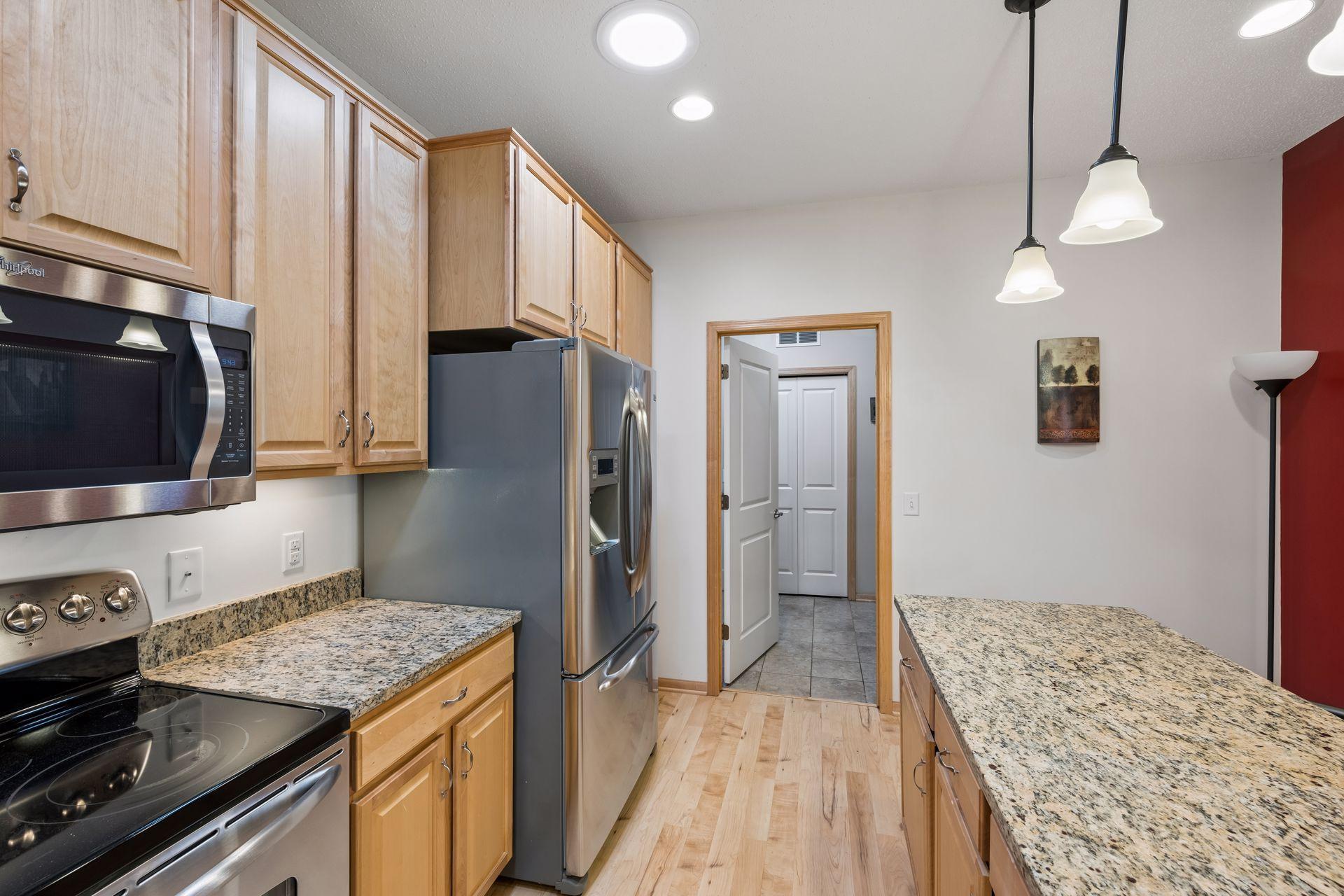 Off the kitchen is a terrific laundry/mud room with tile floors.