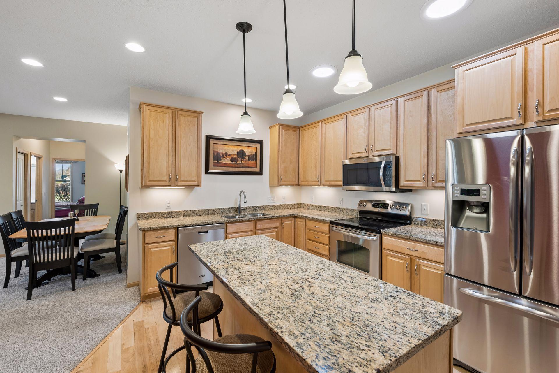 The kitchen also boasts granite countertops! Convenient center island is great for baking or everyday meals on the go!