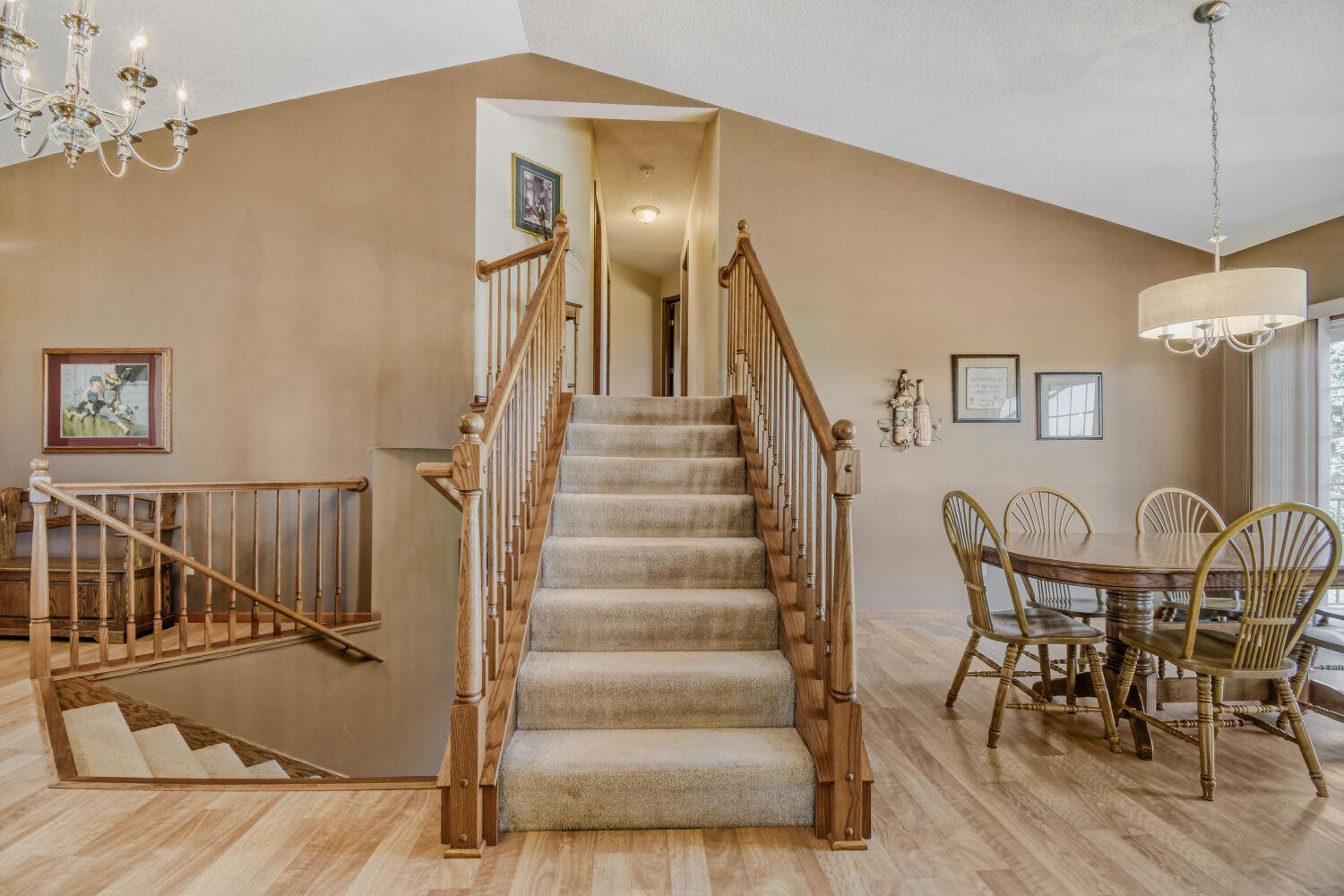 Leading to the upper level bedrooms and bathrooms