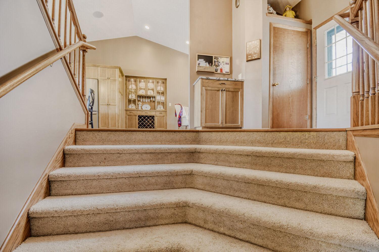 Open staircase to the 3rd level family room