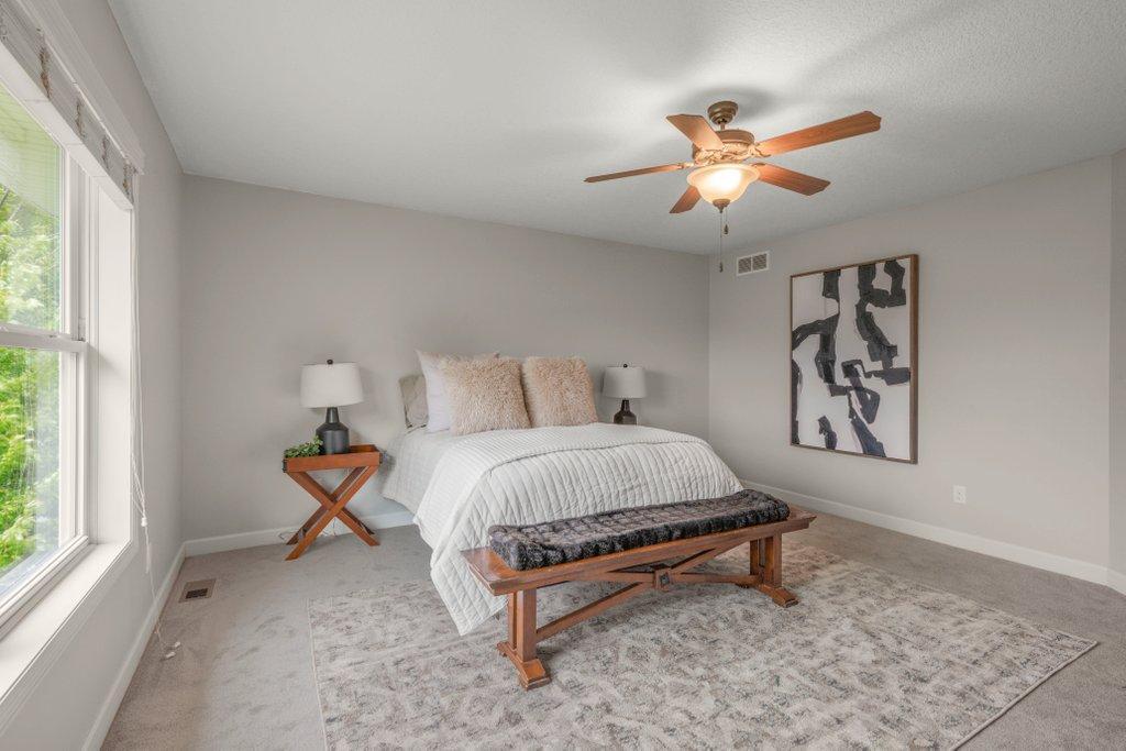 Room for even a California King bed and bedroom set!