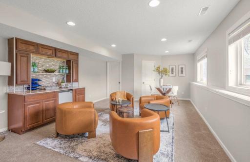 Fully finished basement w/built-in dry bar