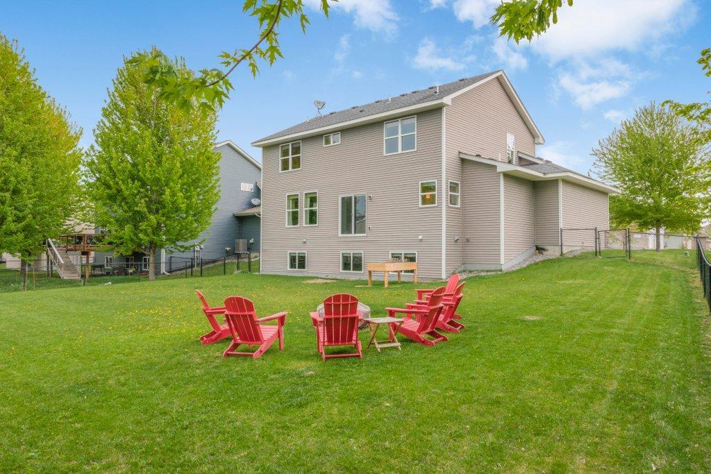 Large fenced backyard perfect for firepit nights