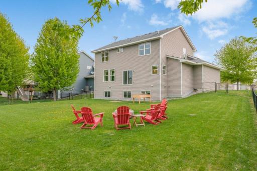 Large fenced backyard perfect for firepit nights
