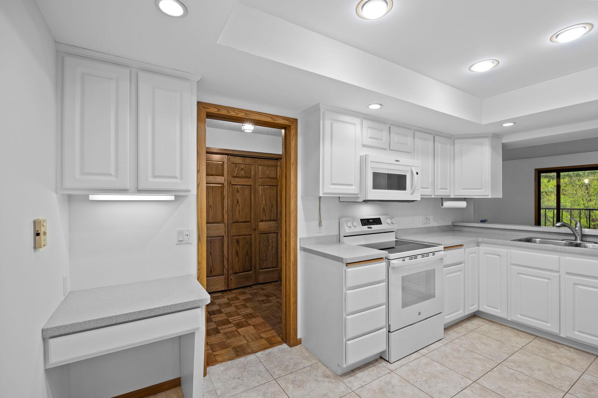 A built-in desk or drop zone adds everyday convenience.