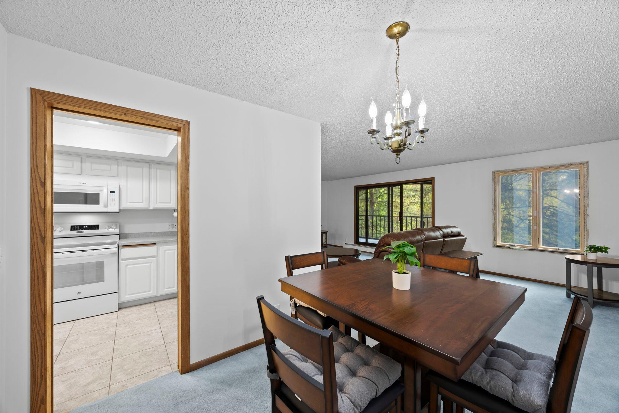 Adjacent informal dining area offers space for easy hosting and daily meals.
