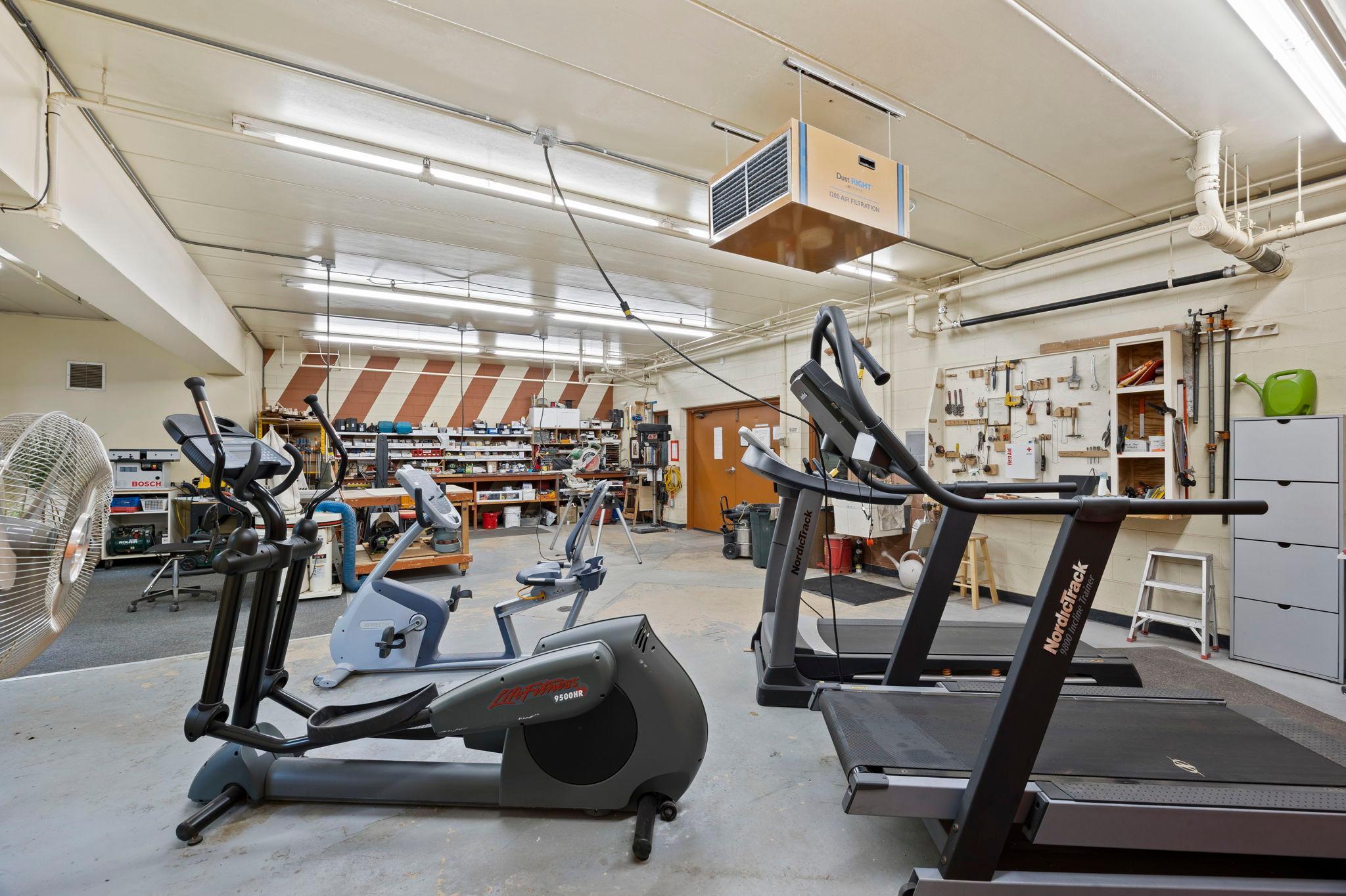 The lower level is packed with amenities, including a fitness center.