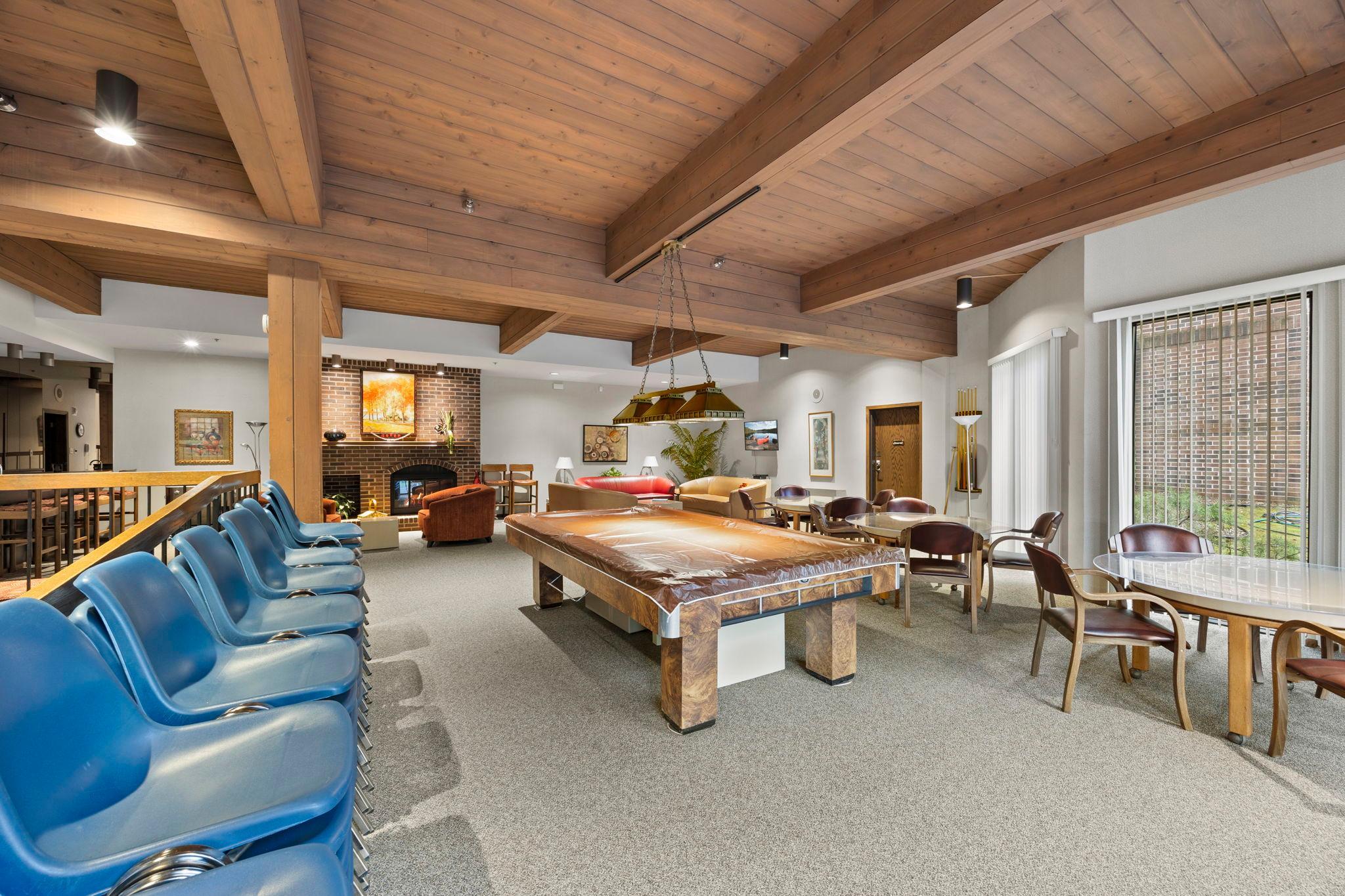 Complete with pool table and comfortable seating.