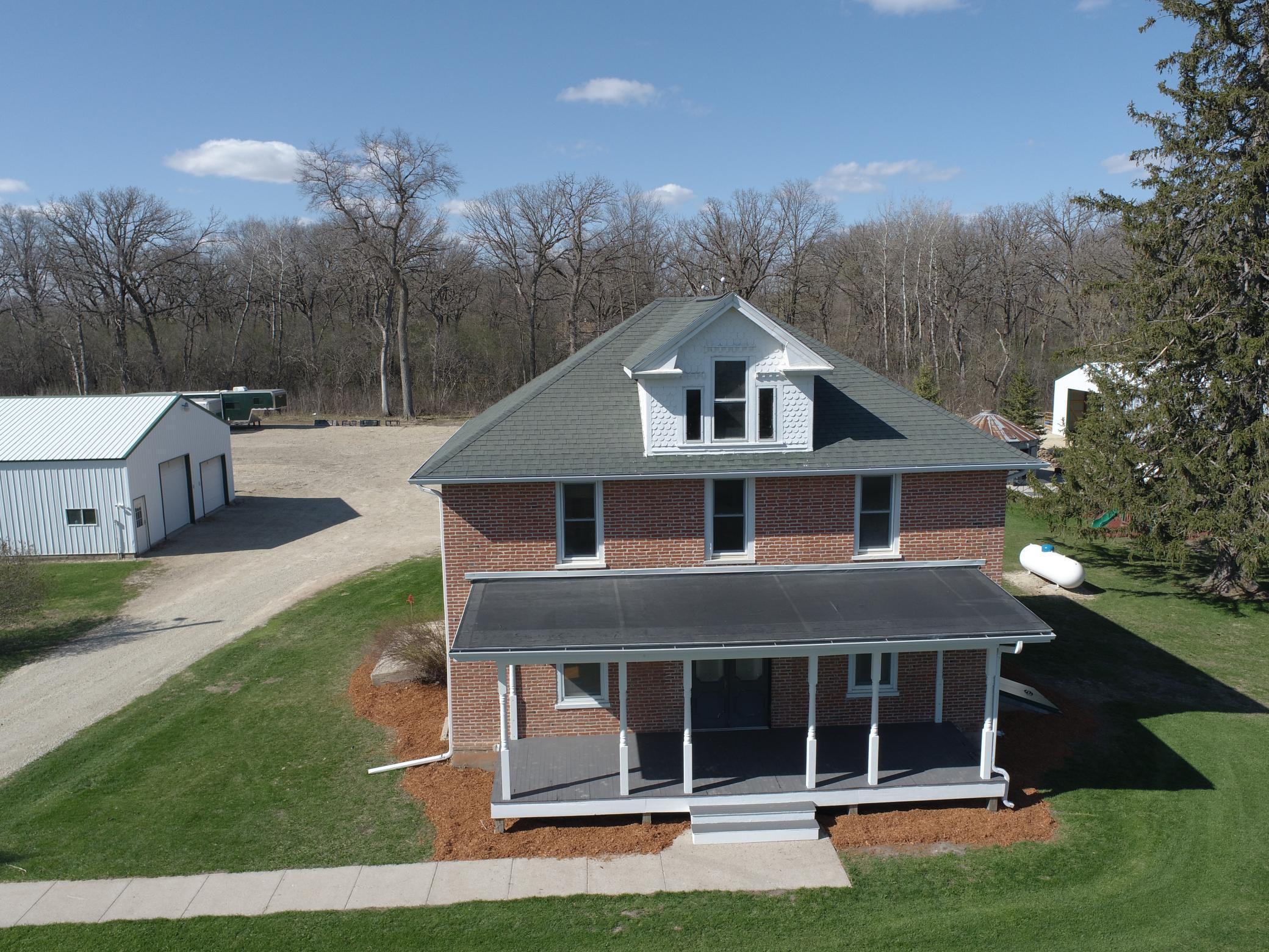 classic 2 story brick farmhouse
