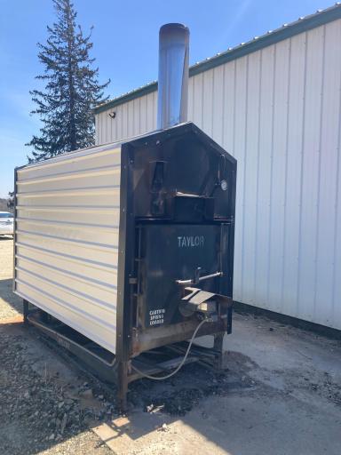 wood boiler, with approximately 2 years worth of wood.