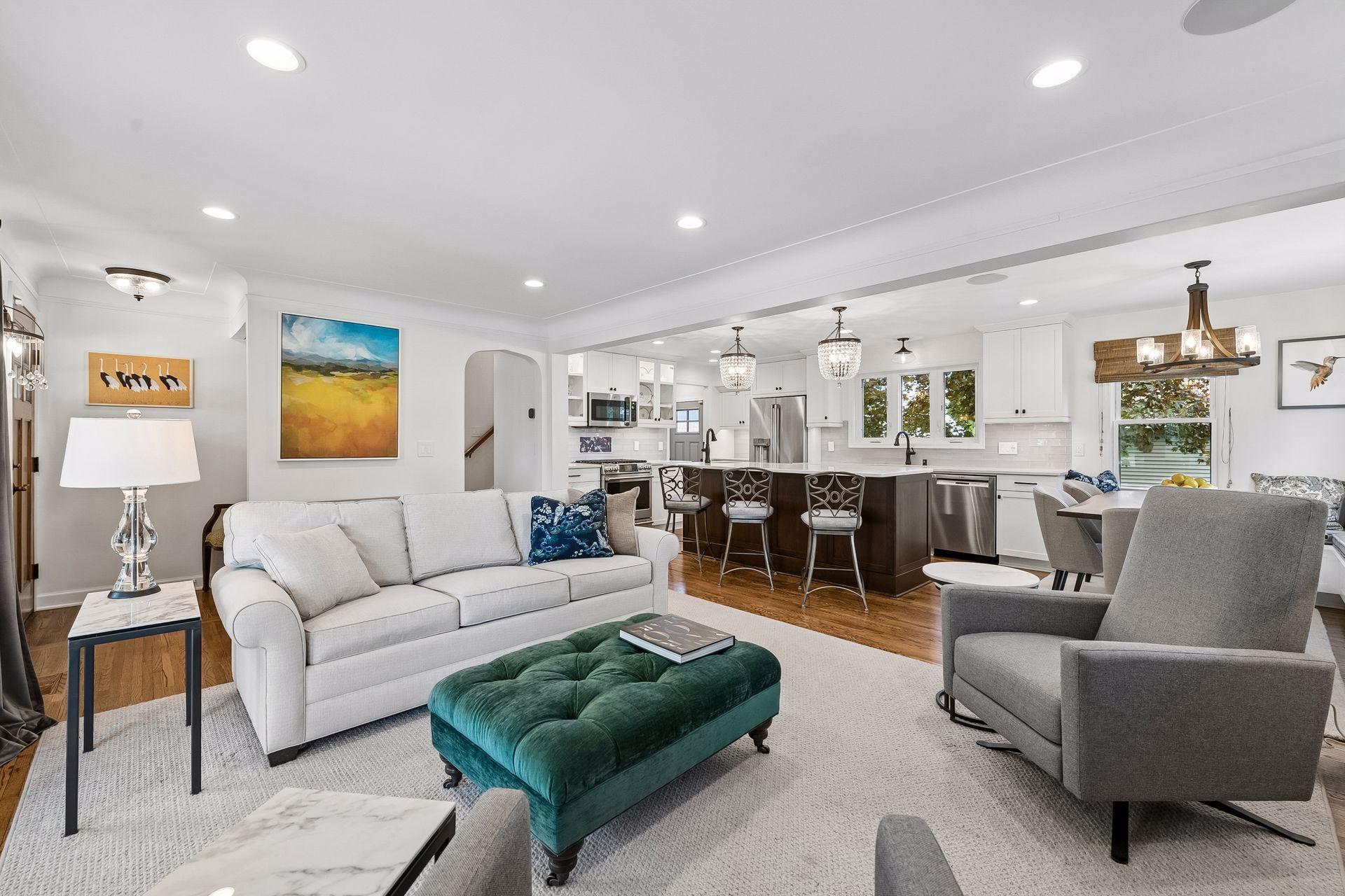 Stunning lighting, flooring, and crisp finishes throughout offer a wonderful home to enjoy preparing meals or entertaining guests.