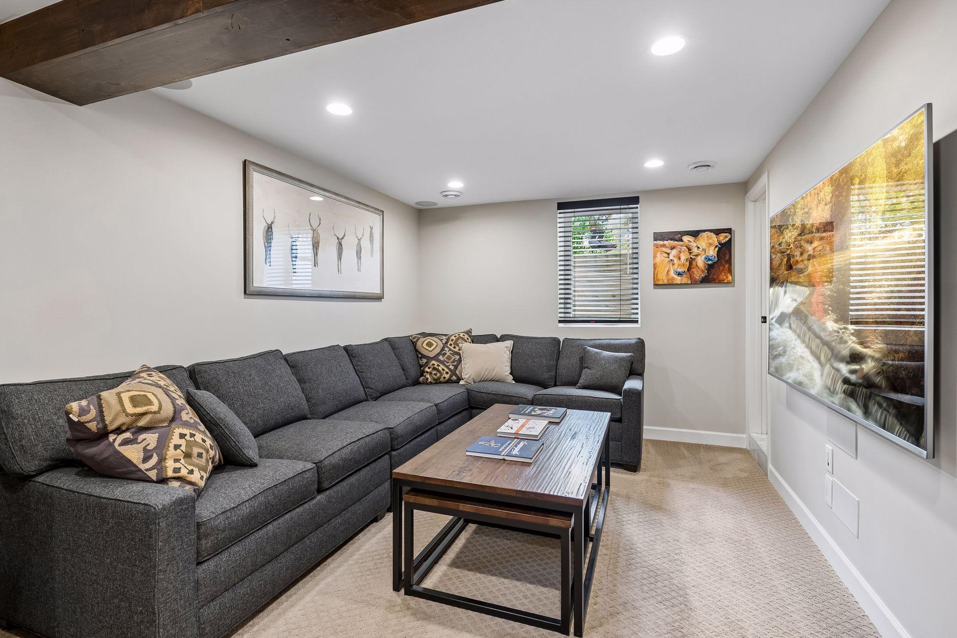 Lower level family room with surround speakers built in, egress window and space for your big-screen TV.