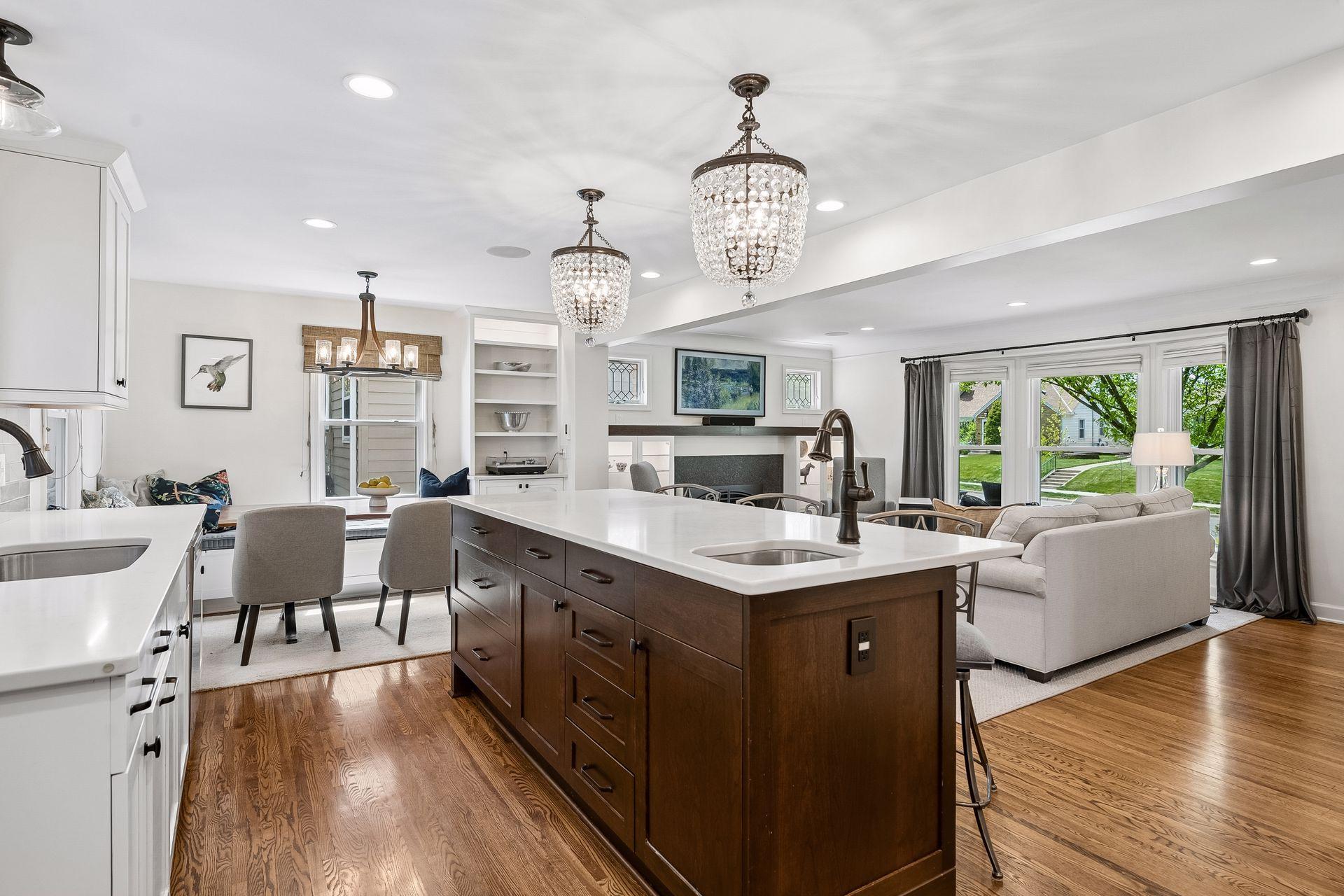View over the center island of dining area and living room
