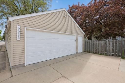 Enviable 2+ car garage off the alley, you'll get spoiled at having all the extra storage for your toys. Garage features an upstairs loft with steps and electric lift to move items up and down. (see supplements)