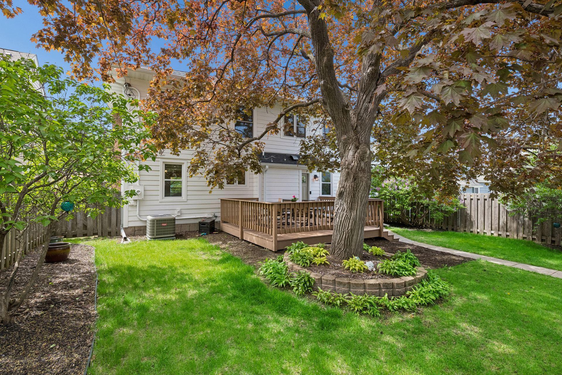 Rear view of home and yard