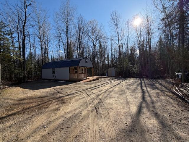 Cabin from driveway into property