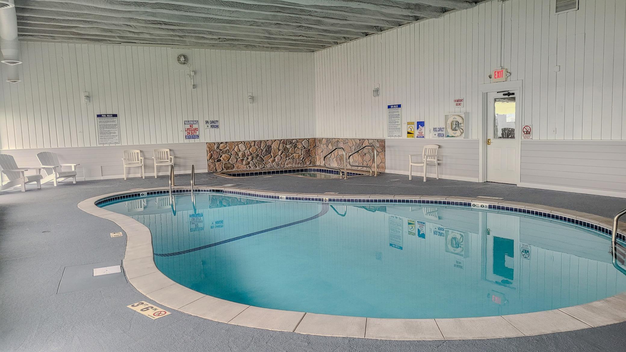 Pool is just steps down the hallfrom the unit