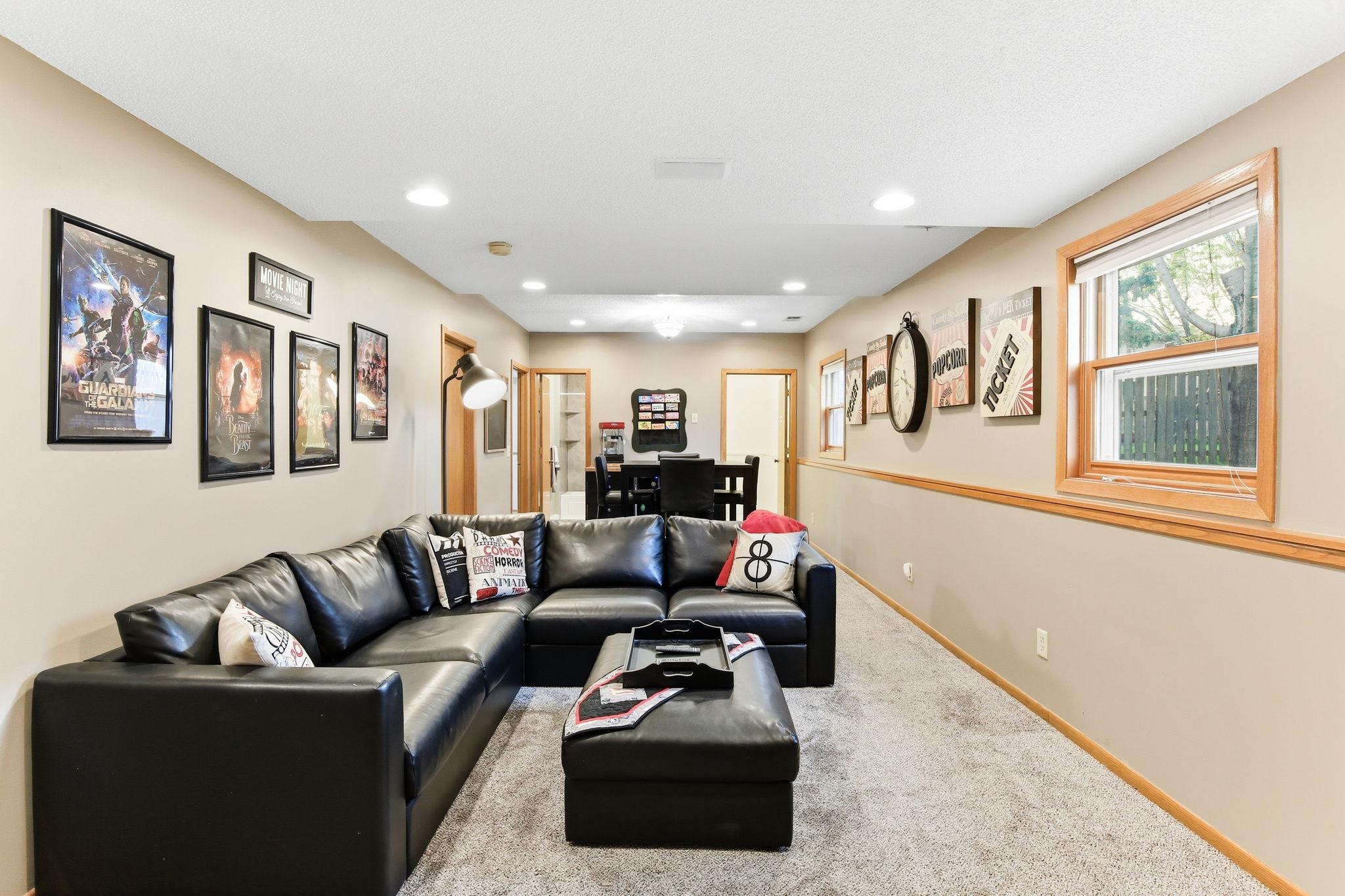 Lower-level family room offering a spacious and versatile area perfect for relaxing, entertaining, or movie nights, with a comfortable layout that adds valuable additional living space.