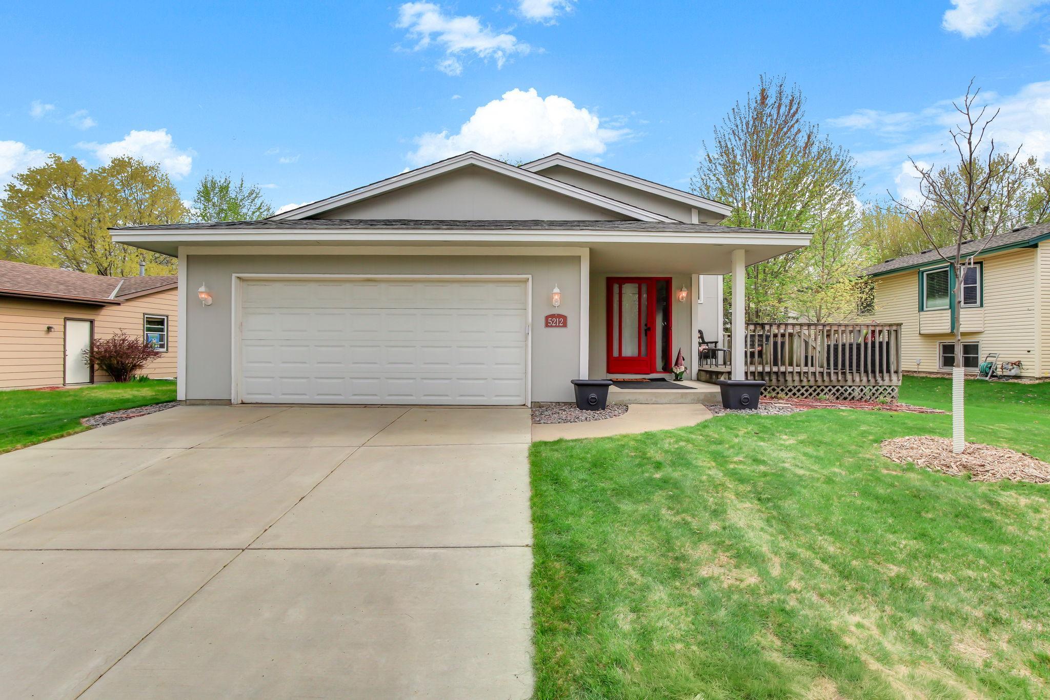 Spacious outdoor deck ideal for relaxing or entertaining, offering a great extension of the living space with room for seating, grilling, and enjoying the outdoors in comfort.